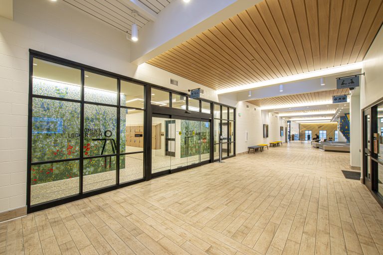 Hallway and locker room entrance at Berthoud Recreation Center in Larimer County, Colorado. Prime engineering consulting by 360 Engineering.